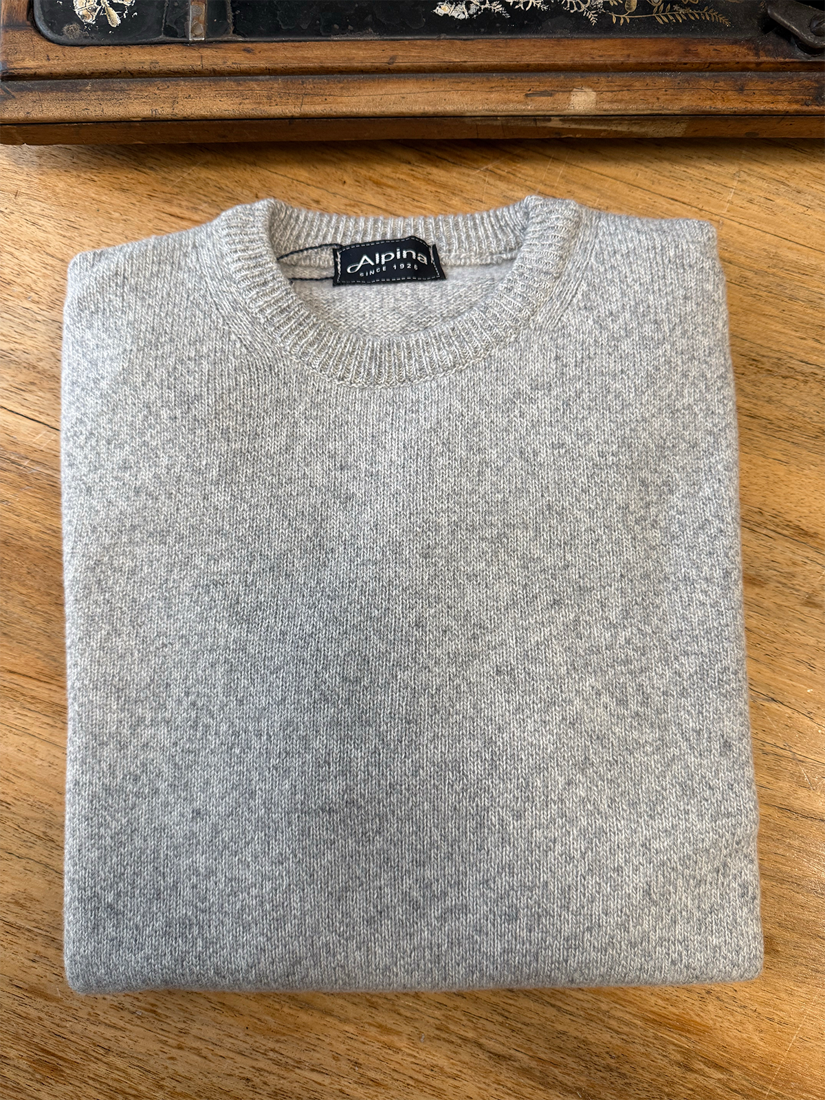 Maglia moulinè grigia in pura lana